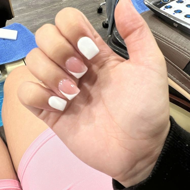Classic short white French tips on square nails